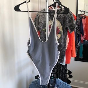 NWOT. Thong Body or Swimsuit